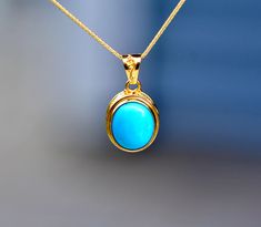 This gorgeous pendant is made with solid hallmarked 18k gold and has a bezel set genuine turquoise stone  Paired with a lovely 0.8mm 18k solid gold wheat chain it is hard to find a natural stone as full of life as this. Introducing our exquisite Bezel-Set Arizona Blue Turquoise Pendant Necklace in 18k Gold--a true embodiment of natural beauty and timeless elegance. This stunning piece of jewelry is more than a necklace; it's a statement of your individuality, a symbol of luxury, and a connection Turquoise Jewelry Photography, Sleeping Beauty Turquoise Jewelry, Bezel Set Necklace, December Birthstone Jewelry, 18k Gold Chain, Turquoise Pendant Necklace, Southwest Desert, Arizona Turquoise, Set Necklace