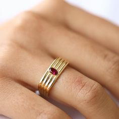 Discover the elegance of our 14k gold ring, beautifully adorned with sparkling zircon stones. This delicate, handcrafted ring is perfect for women who appreciate minimalist jewelry with a touch of luxury. Whether you prefer rose gold, yellow gold, or white gold, this stackable ring fits seamlessly into any collection. Ideal as an anniversary gift, birthday gift, or a thoughtful Mother's Day gift, it's a versatile piece that can be worn every day. Crafted with care, this dainty ring embodies the Luxury Gold Ruby Stackable Ring, Yellow Gold Dome Ring With Cubic Zirconia For Gift, Modern Gold Ruby Ring As Gift, Modern Gold Ruby Ring For Gift, Gold Plated Birthstone Rings As Gift, Yellow Gold Dome Ring With Gemstone For Gift, Modern Gold Ruby Ring, Modern Gold Ruby Ring For Anniversary, Gold Plated 14k Stamped Anniversary Rings