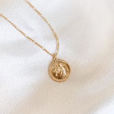 Handcrafted • Waterproof • Tarnish resistant 14k gold filled Saint Anthony coin on a 14k gold filled Figaro Chain. Unisex and available in 2 lengths. Tarnish Resistant 14k Gold Filled Medallion Jewelry, Everyday 14k Gold Filled Coin Pendant Jewelry, 14k Gold Figaro Chain Medallion Necklace, 14k Gold Filled Coin Pendant Jewelry, 14k Gold Medallion Necklace With Figaro Chain, 14k Gold Filled Jewelry With Coin Pendant, Everyday Gold Plated Coin Jewelry, 14k Gold-filled Yellow Gold Coin Pendant Jewelry, 14k Gold Filled Yellow Gold Coin Pendant Jewelry