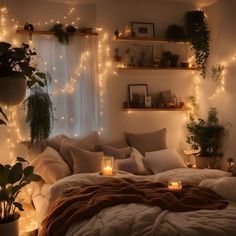 a bedroom with lights and plants on the shelves above the bed, along with candles