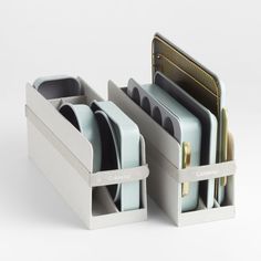 a set of office supplies sitting in a holder