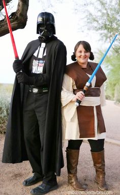 a man and woman dressed up as darth vader and princess leisa from star wars