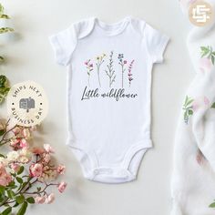 Check out this item in my Etsy shop https://www.etsy.com/listing/1409672749/little-wild-flower-baby-onesie Painted Baby Onesies, Spring Onesies, Baby Onsies Ideas Girl, Onsies Ideas Girl, Baby Girl Onesies Vinyl, Wildflower Onesie, Baby Onesie Ideas, Baby Onesies Girl, Onesie Baby Announcement