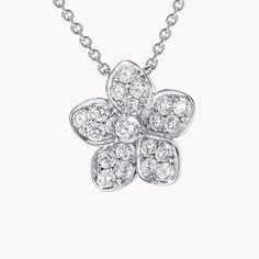 High jewellery craftsmanship meets contemporary style in our Wild Flower necklace. Joyful and uplifting, diamonds flourish in rare abundance upon the lifelike petals, which unfurl with extraordinary lightness, like flowers freshly bloomed. The Wild Flower collection is an invitation to escape into a garden that grows just for you. From trios and individual blooms to floral clusters and blossoms laid out in a row, each Wild Flower jewel is a statement of delicacy and of empowerment, designed to b Large Diamond Stud Earrings, Triple Diamond Ring, Double Diamond Ring, Large Diamond Rings, Flower Diamond Ring, Pave Diamond Earrings, High Jewellery, Flower Collection, Pendant Diamond