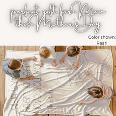 three children laying on a blanket with the words perfect gift for mom this mother's day