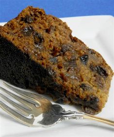 a piece of cake on a plate with a fork