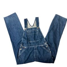 Features: * Decade: 1970 - 80's * Style: Workwear * Overalls * Solid * Made in Unknown * Machine Wash Size: Mens 34 Measurements: Waist: 34 in / 86 cm Inseam 32 in / 81 cm Condition: Pre-Owned Good Good condition, they do have some various faint spots, should come out in the wash. Vintage Denim Blue Jeans With Pockets, Vintage Medium Wash Washed Overalls, Retro Style Dark Wash Jeans For Workwear, Retro Dark Wash Jeans For Workwear, Dark Wash Retro Jeans For Workwear, Retro Dark Wash Jeans For Work, Dark Wash Retro Jeans For Work, Vintage Cotton Denim Jumpsuit In Medium Wash, Vintage Jeans With Button Closure For Work