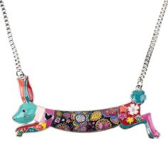 Following our colourful series, these necklaces feature the love we feel for Rabbits. These adorable necklaces are perfect for adding a colourful touch to your outfit and a great way to support animals at risk. You will not only receive compliments but also help protecting our wildlife. This is perfect for you, or as a gift for a loved one. Limited stock, get yours before they're gone Product details: Material: Zinc Alloy Size: 5.0cm x 3.7cm (1.97'' x 1.46'') Chain Length: 45cm (17.71") (Include Whimsical Multicolor Pendant Necklace, Whimsical Multicolor Charm Necklaces With Lobster Clasp, Fun Multicolor Jewelry With Lobster Clasp, Cute Multicolor Jewelry With Lobster Clasp, Cute Multicolor Pendant Jewelry, Colorful Fun Jewelry Gift, Nickel-free Multicolor Pendant Necklace, Playful Adjustable Silver Necklace, Playful Colorful Jewelry Gift