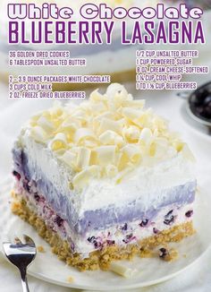 a white chocolate and blueberry lasagna dessert on a plate with a fork