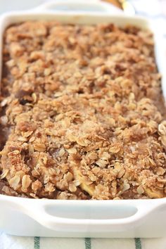 a casserole dish with oatmeal topping in it