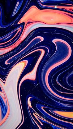 an abstract background with blue, pink and black swirls in the center on top of each other