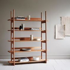 a book shelf in the corner of a room