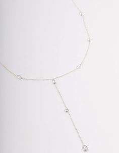 Opt for timeless, quality accessories from our premium Boutique Collection! This diamante, lariat style Y-shaped necklace is crafted with genuine silver plating for long-lasting wear. Style yours with a pair of simple silver studs for a pared back look. | Lovisa Silver Plated Diamante Lariat Y-Necklace Sterling Silver Lariat Backdrop Necklace With Adjustable Chain, Delicate Silver Lariat Necklace For Party, Adjustable White Gold Lariat Necklace, Delicate Silver Lariat Necklace With Long Drop, Delicate Silver Lariat Necklace With Adjustable Chain, Delicate Silver Lariat Necklace, Sterling Silver Lariat Necklace For Party, Sterling Silver Clavicle Chain Lariat Necklace For Parties, Adjustable Y-shape Clavicle Chain Drop Necklace