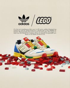 an advertisement for adidas with legos on the ground