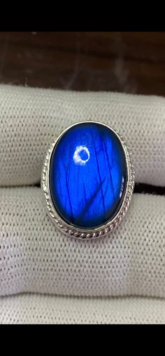 Stainless steel Ring with Royal blue labradorite stone || size=7 US || size=7 us pieces=1 gram= 8.47 (with stone) Blue Labradorite Ring, Blue Moonstone Cabochon Ring, Blue Labradorite Moonstone Ring, Blue Labradorite Rings As Gift, Blue Labradorite Rings For Gift, Blue Labradorite Rings For Gifts, Gift Blue Labradorite Rings, Stainless Steel Ring, Blue Labradorite