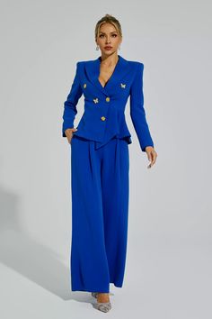 Elevate your style with the Viola Blue Butterflies Button Blazer Set. Designed for the refined woman, this two-piece ensemble features a blazer adorned with a floral button and butterfly embellishments. The set also includes a pair of elegant, irregularly cut trousers. Make a statement with this sophisticated and fashionable attire.  Top Length: Approx 62cm Pants Length: Approx 111cm Materials: Polyester Gentle Dry Clean Only  The model is 5 ft 7 and wears size S  Color may vary due to lighting Svecane Haljine, Refined Woman, Clothes Capsule Wardrobe, Royal Blue Suit, Blazer Pattern, As You Like It, Blue Butterflies, Bandage Midi Dress, Woman Suit Fashion