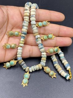 Amazing antique Roman glass beads with 20k gold and natural turquoise Ancient Roman Glass, Gold Pendants, Crystal Bead Necklace, Roman Glass, Handmade Jewelry Gift, Antique Glass, Stunning Earrings, Natural Turquoise, Agate Beads