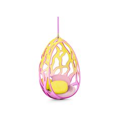 a pink and yellow hanging chair on a white background with a pillow in the middle