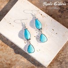 Teardrop Triangle ​Turquoise Silver Base Dangling Earring Dimension: 7*1.5 cm Southwestern Turquoise Teardrop Earrings For Gift, Turquoise Drop Bohemian Jewelry, Turquoise Bohemian Drop Jewelry, Bohemian Light Blue Teardrop Earrings, Bohemian Turquoise Drop Jewelry, Handmade Turquoise Teardrop Earrings Southwestern Style, Southwestern Turquoise Teardrop Earrings, Handmade Turquoise Teardrop Earrings In Southwestern Style, Handmade Southwestern Turquoise Teardrop Earrings