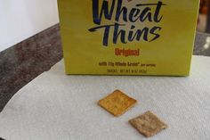 a box of wheat thins sitting on top of a table