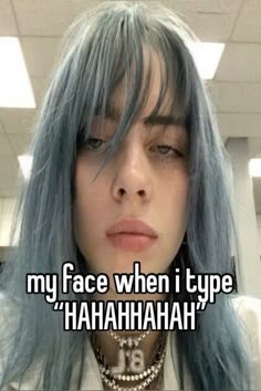 a girl with blue hair has her eyes closed and the caption says, my face when