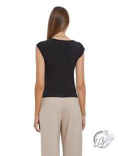 Introducing the "Lustrous Luxe Scoop Neck Top," a perfect embodiment of effortless elegance and luxurious comfort. This finely crafted tee is made from a blend of rayon siro fabric, creating a sumptuously soft and lustrous texture that sets it apart. The scoop neck design enhances the neckline with a graceful and flattering silhouette, offering a touch of sophistication to your casual wardrobe. The lustrous finish adds a subtle sheen to the fabric, creating a visual allure that elevates this top Chic Modal Top With Scoop Neck, Chic Modal Crew Neck Tops, Chic Crew Neck Modal Top, Black Modal Tops For Spring, Black Modal Tops For Summer, Chic Modal Scoop Neck Top, Spring Black Modal Top, Chic Scoop Neck Modal Top, Compressive Scoop Neck Tank Top With Light Support