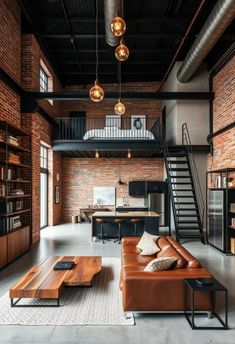 an industrial living room with brick walls and exposed ceilings, leather couches, wooden coffee table