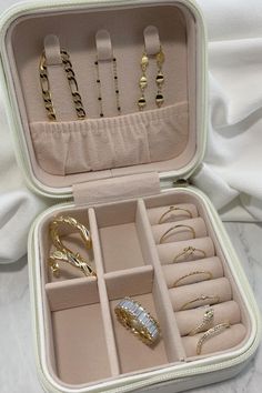 Don't have a place to store your jewelry? We have a solution for you! How cute are these Nikki Smith traveling cases? We know all too well how frustrating it is to travel with your jewelry and have it become tangled by the time you reach your destination. This sweet little box will solve those problems for you! Complete with an area for studs, earrings, necklaces, rings, and bracelets, you'll be organized in no time! Jewerly Cases, Blush Jewelry, Triple Hoop Earrings, Jewelry Safe, Travel Jewelry Case, Textured Ring, Travel Jewelry, Jewelry Case, Ring Collections