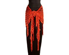 Pumpkin orange crocheted belly dance hip scarf, or shawl, enhances any outfit. This is perfect for cabaret or tribal belly dance costumes. DETAILS This hip scarf is sumptuously velvety soft being made with a fuzzy yarn. The colors is a warm pumpkin orange throughout the scarf. This is perfect for Halloween or fall colors. There is a nice band across the top and tassels complete the decoration. This item is made one-at-a-time.  This item can also be made in cloudy grey, mustard yellow, ivory, teal green, cherry red, purple, silver grey, olive green, navy blue, black, or blush pink - contact Jaiya for special orders. SIZE Women's size ONE-SIZE. Hip scarf: Approximately 101 inches from side to side (from each tassel end) by 32 inches from top to bottom (top to bottom of tassel). CONDITION Thi Bohemian Fitted Sarong For Festivals, Fitted Bohemian Sarong For Festival, Red Bohemian Sarong For Festivals, Belly Dance Hip Scarf, Hip Scarf, Hip Scarves, Belly Dance Costumes, Pumpkin Orange, Women's Costumes