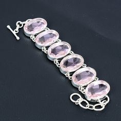 Note : Due to the natural formation of this gemstone. Slight variation in design and color are to be expected. Faceted Pink Kunzite Bracelet 925 Sterling Silver Bracelet Gemstone Handmade Bracelet Adjustable Chain Bracelet Antique Jewelry Gift For Her Handmade Silver Bracelet SKU : YB-122 Gemstone : Pink Kunzite Stone Shape : Oval Metal Purity : 925 Sterling Silver Bracelet Length : 9 Inches With Adjustable Chain Kunzite Bracelet, Handmade Wedding Gifts, Gemstone Pendant Jewelry, Handmade Boho Jewelry, Pink Kunzite, Fossil Jewelry, Bracelet Wedding, Adjustable Jewelry, Handcrafted Bracelets