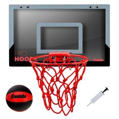 an image of a basketball going through the hoop with its net and ball attached to it