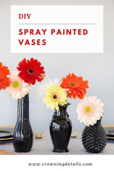 three vases with flowers in them sitting on a table next to a sign that says diy spray painted vases