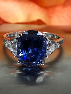 Excited to share this item from my #etsy shop: Oval Ceylon Blue Sapphire And Trillion Accents Set In A Basket Style Setting  In 14K White Gold  #5629 Engagement Ring Blue, Ceylon Blue Sapphire, Basket Style, Purple Amethyst Ring, Yellow Engagement Rings, Rustic Bathrooms, Sapphire Engagement Ring Blue, Sapphire Rings, Rose Engagement Ring