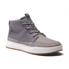 Men's Timberland Maple Grove Mid Sneaker - Medium Grey Nubuck Add the Maple Grove sneakers to your casual wardrobe. Durable, premium Timberland® leather and CORDURA® fabric and a lace-up style ensure a secure and comfortable fit. DETAILS: Upper made with Premium Timberland® Leather and CORDURA® fabric Lace-up style ReBOTL™ fabric lining containing at least 50% recycled plastic 45% of the rubber in the outsole is sourced from farms committed to regenerative agriculture Imported Rugged Timberland High-top Sneakers, Rugged High-top Timberland Sneakers, Gray Leather High-top Sneakers With Laces, Rugged Suede Lace-up Sneakers, Outdoor Canvas High-top Sneakers With Laces, Timberland Leather Sneakers With Plain Toe, Timberland Casual Sneakers With Textured Sole, Timberland Sneakers With Laces And Round Toe, Casual Timberland Sneakers With Textured Sole