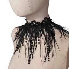 Fashion black ostrich fringe feathers collar with black lace embellish  One size, adjustable.  Length: 12 Inches Width:  4-6 Inches  Fastens with double satin ribbon on the back.  It is perfect to wear with corset, evening or with wedding dress, or a perfect romantic gift.  Find more accessories here in my shop : https://www.etsy.com/shop/HouseOfTooFan Please note that due to lighting effects, monitor's brightness, contrast and other settings, there might be some slight differences in the color tone/shade of the website's photo and the actual item. Item photos are enlarged to show details- please note actual sizes. All my items are handcrafted, that's why sizes and shapes may vary. !! Important notice !! If this is a gift or you need it at an exact date, please check the delivery time, als