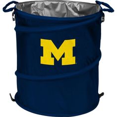 the michigan wolverines logo is shown on this large blue and yellow trash can holder