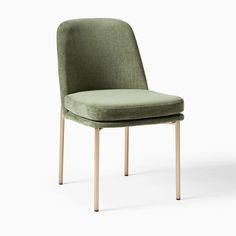 an upholstered green chair with wooden legs and back rests against a white background