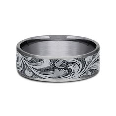 Crafted with eye-catching detail, this men’s barrel script wedding band features a striking large, detailed scrolling pattern in 14K gold that wraps around the center. Thin edges create contrast in this 7.5-ring, while a satin tantalum interior completes the look. The strongest metallic element by weight, tantalum is a light gray metal with great durability and strength that will not fade or change in color over time. Tantalum is a rare, high-density, silver-gray metal that is durable, scratch-r Measure Ring Size, Country Rings, Helzberg Diamonds, Wedding Band Ring, 14k White Gold Ring, Anniversary Bands, Ring Size Guide, Types Of Rings, Womens Engagement Rings