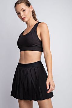 Activewear...but make it fashion! Tennis skirts are so popular, and this one is sure to be your favorite with its super soft fabric and classic pleat detail. 2 in one skirt with attached shorts Pockets in shorts, perfect for sports! Waist coin/key pocket 84% Poly Microfiber 16% Spandex Imported Tennis Skirt Black, Tennis Skirts, Tennis Skort, Athletic Apparel, Tennis Skirt, Sweater Blouse, Bottoms Pants, Short Sets, Soft Fabric