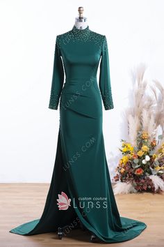 Shiny crystals embellishments enhance the stylish definition of the decent high neckline, long sleeves and high side slit design on this emerald satin mermaid dress. It is a striking choice for prom party. Dark Green Prom Dress Long Sleeve, Dark Green Prom Dress Long, Elagant Dress, Dark Green Prom Dress, Green Prom Dress Long, Satin Mermaid Dress, Plain Midi Dress, Shiny Crystals, Satin Outfits