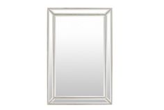 a white framed mirror on a wall with an empty space for the reflection to be seen