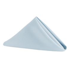 a folded napkin sitting on top of a white table