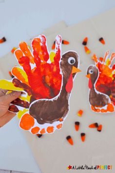 a child's handprint turkey and bird craft