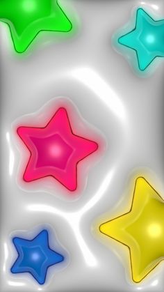 four different colored stars are shown in this image, and one is on top of the other