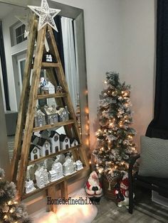 a small christmas tree in the corner of a room