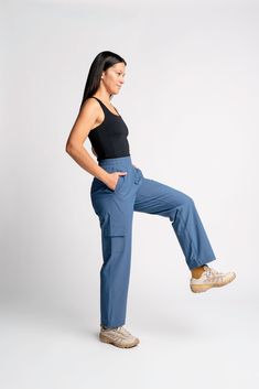 Our softest, stretchiest, most versatile pant yet. Featuring lightweight yet durable Global Recycle Standard certified nylon blended with spandex, the go explore essential cargo pant was crafted to be the only outdoor pant you need. Expertly tailored and designed by women for the perfect fit, these pants feature: Soft, stretchy, secure high waisted fit with an internal adjustable drawstring Five pockets, including side cargo pocket Lightweight, quick dry fabric (Global Recycle Standard certified