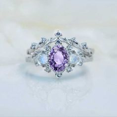 clio-https://clio.giliarto.com/ring/1/766-7x5 Purple Engagement Ring Silver, Purple Rings Engagement, Lavender Engagement Ring, Gold Floral Engagement Ring, Purple Wedding Rings, Purple Engagement Rings, Dream Proposal, Pretty Engagement Rings, Floral Engagement Ring