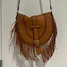 Only Worn Once Brown Crossbody Saddle Bag For Errands, Trendy Brown Hobo Bag With Fringe, Casual Brown Saddle Bag With Detachable Strap, Casual Brown Bag As Fashion Accessory, Brown Tote Saddle Bag For Errands, Brown Saddle Tote Bag For Errands, Light Brown Crossbody Shoulder Bag For Errands, Brown Fringe Bag For Everyday Use, Light Brown Shoulder Bag With Adjustable Strap For Errands