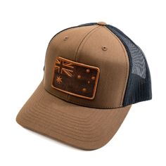 From the Land Down Under to the Top of Your Head The cap presents a tribute to Australian heritage with a beautifully crafted leather patch that features the iconic Southern Cross and Union Jack, symbols of the Australian flag. The deep, earthy tones of the leather patch resonate with Australia's rugged landscapes, while the meticulous stitching pays homage to the enduring Aussie spirit. Each cap is enhanced with a unique leather patch, subtly showcasing our dedication to durability and design. Brown Waxed Finish Hat With Flat Brim, Brown Flat Brim Hat With Waxed Finish, Brown Hat With Waxed Finish And Curved Brim, Brown Waxed Finish Hat With Curved Brim, Adjustable Leather Snapback Hat In Brown, Brown Leather Snapback Hat, Brown Waxed Finish Curved Brim Hat, Adjustable Leather Brown Snapback Hat, Adjustable Brown Leather Snapback Hat