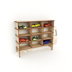 a wooden shelf with toy cars on top of it and shelves below to the side